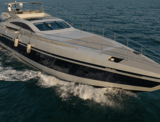 “Predator Stealth 130 luxury yacht cruising, offering a perfect blend of power and sophistication for up to 20 guests.”